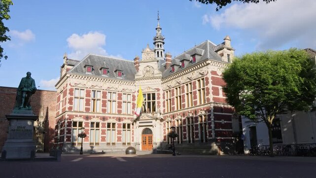 The beautiful old university building in Utrecht, Netherlands, showcasing intricate architecture and historical charm under a bright sky.