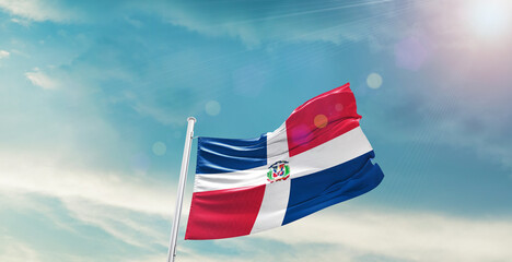 Dominican Republic national flag waving with beautiful sky.