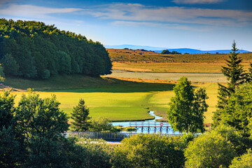 A small pond at the gateway to the Aubrac region in central France.
A small lake surrounded by...