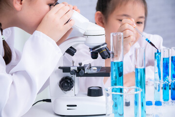 Learning and education for students in classroom, instruction by teacher, children participate in...