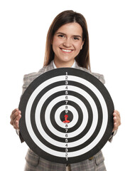Targeting. Smiling businesswoman with dart board on white background
