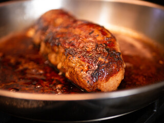 pork chops in a frying pan