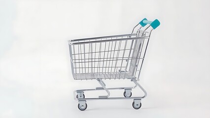 Empty metal shopping cart isolated on a plain background.