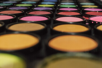 A palette with water-soluble paints for drawing. Abstract background. Back to school