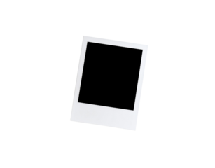 Slightly tilted blank white instant photo frame with a classic thick bottom border.