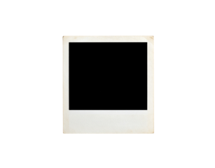 Vintage blank instant photo frame with aged textured paper and worn yellowed edges.