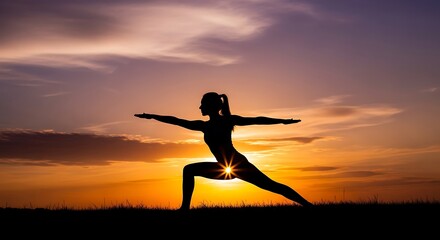 Silhouette of a woman performing a yoga pose against a vibrant sunset sky