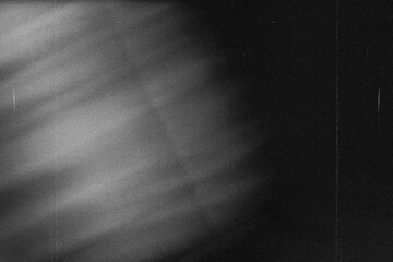 grunge retro film overlay effect with scratch dust and light leaks,retro grain noisy film distressed texture light leak flare on black background