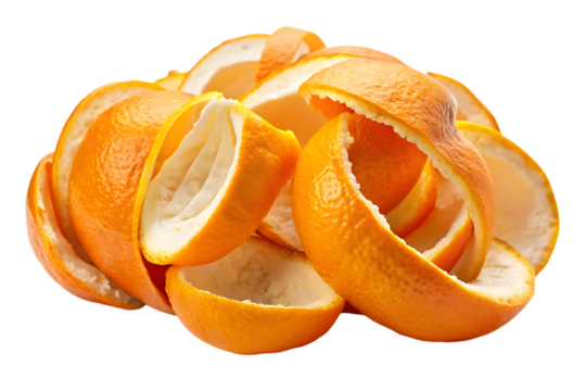 Pile of freshly peeled bright orange citrus fruit skins with white pith isolated on a transparent background