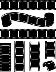 Black film strips and reels in various orientations movie cinema