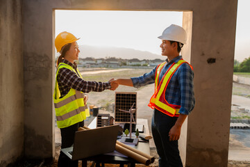Renewable energy technician, yellow hard hat, safety vest, solar panels, clean energy wind...