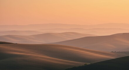 Rolling Hills at Dawn: A Serene Landscape with Soft, Warm Hues and Distant Ridges