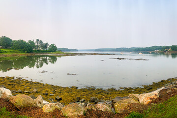 Quiet cove with mountains in the background