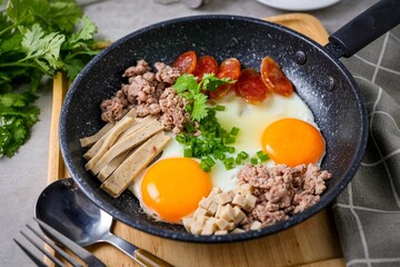 Skillet Egg,Pan Fried Egg with Toppings for morning breakfast ,thai called Khai Krata