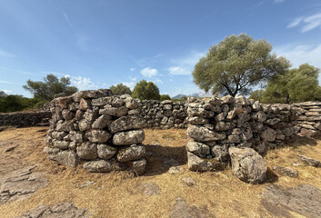 Remains of prehistoric stone huts in the Nuragic village of Serra Orrios, Sardinia