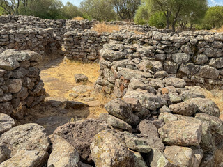 Remains of prehistoric stone huts in the Nuragic village of Serra Orrios, Sardinia
