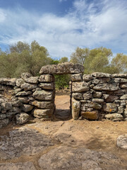Remains of prehistoric stone huts in the Nuragic village of Serra Orrios, Sardinia