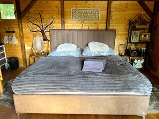 Bedroom interior in a country house in eco style