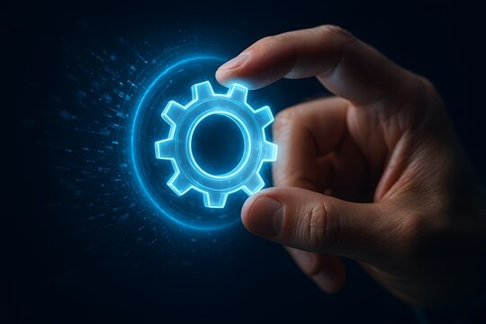 Hand holding glowing gear icon for business process automation and system configuration concept