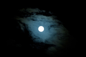 Moonlit Clouds in the Deep Blue Night Sky