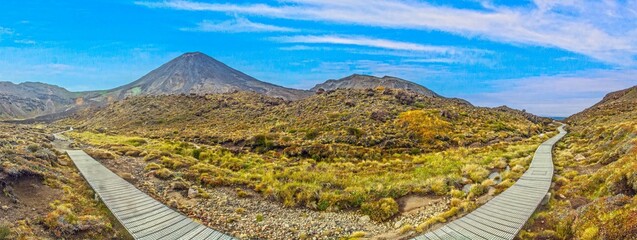 Tongariro boardwalk trail with wide sky view