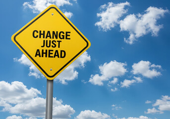 A yellow diamondshaped road sign reads change just ahead