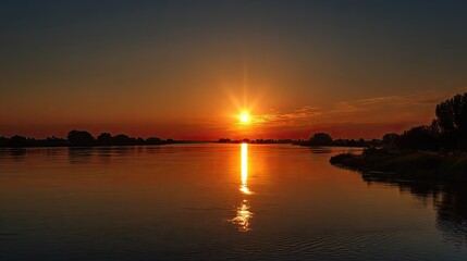 Sunset over a calm river