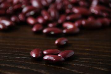 Red beans macro, on a dark wooden table
