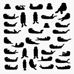 A collection of black silhouette illustrations depicting otters in various poses, including lying down, floating, and standing.
