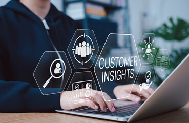 Customer insights and marketing strategy analysis concept. Person using laptop with icons...