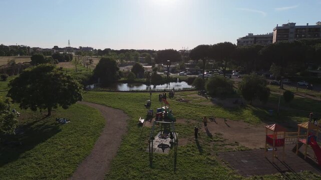 A park in the eastern part of Rome, a landscape that blends the greenery of the trees with the popular buildings.