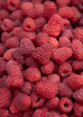Raspberry from courtyard garden, close up. Planting berry at courtyard, July harvest. 