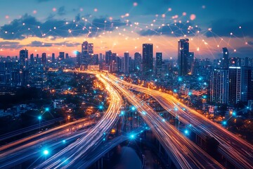 Cityscape at dusk with illuminated highways and digital network connection concept