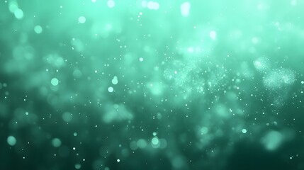 Obraz premium Abstract Teal Green Bokeh Background with Sparkling Dust and Glowing Particles