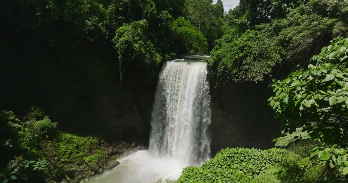 Tropical landscape with waterfall with green forest. Lake Sebu. Mindanao, Philippines.