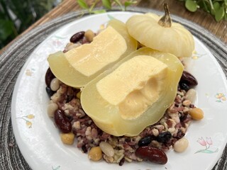 Mini pumpkin stuffed with steamed egg and ginkgo, served with brown rice mixed bean.