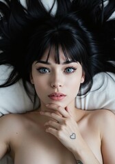 Trendy woman with bangs and blue eyes portrait top-down
