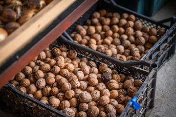 Walnuts in boxes, close-up in a warehouse