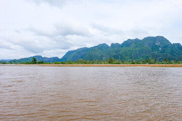 River flow and the fresh green mountain in the south of Laos 