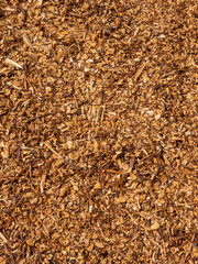 Warm Tones of Natural Wood Chips Texture Background