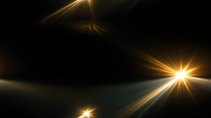 Golden Light Bursts Against Dark Background Creates Dynamic Abstract Effect with Sun Star Flares and Beams for Modern Graphics Projects