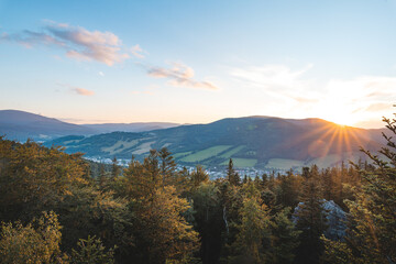 Sunset over forest and valley in Jeseniky mountains, Czech Republic. Harmony between nature and...