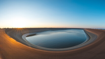 Dlouhe Strane pumped storage dam at sunset in the Jeseniky Mountains. Grid stability. Fighting...