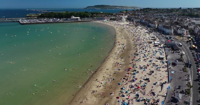 Busy Beach in the Summer in Weymouth, Dorset, England