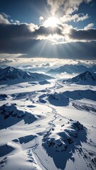 Aerial view of a snowy mountain valley