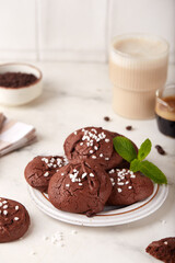 Chocolate brownie cookies with sugar sprinkles. Delicious homemade dessert.