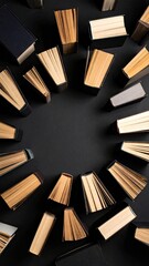 Books arranged in a circle on a dark background (1)