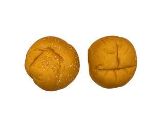 A piece of bread with a brown crust. It is cut in half burger buns, freshly baked buns for homemade...