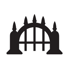 Cemetery gate with iron spikes silhouette