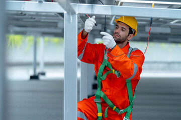 Front view professional technician worker or engineer work with maintenance or check system under...